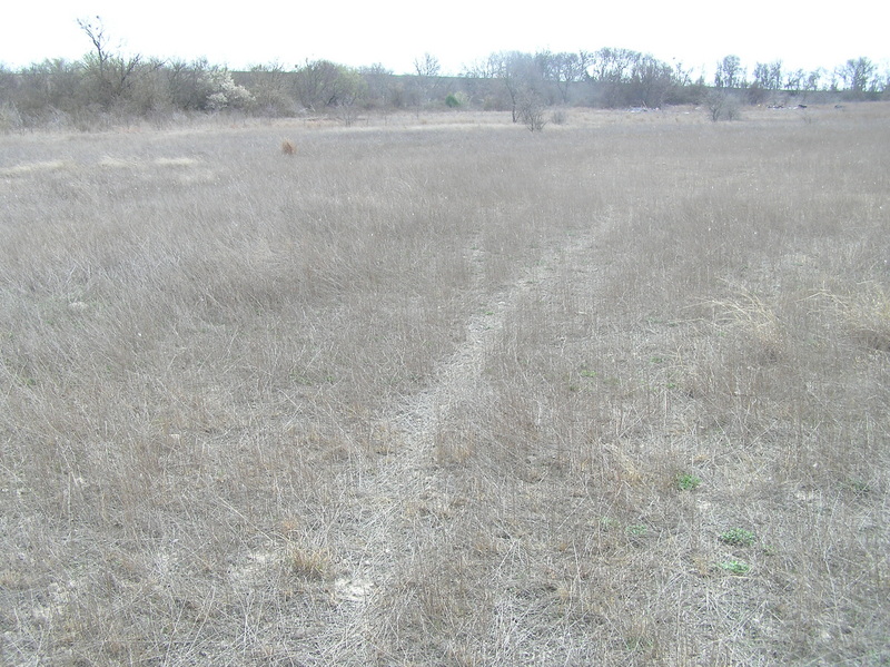 The confluence of 32 North 97 West lies right on this path, in the foreground, looking south-southeast.
