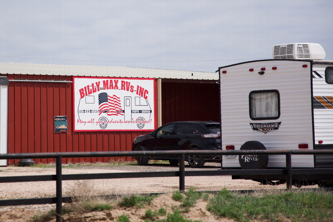 The sign in front of the property, advertising the RV dealership