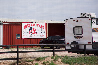 #12: The sign in front of the property, advertising the RV dealership