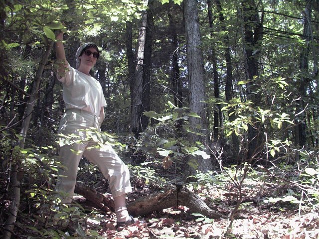 Laurie at the confluence, and some uphill ground