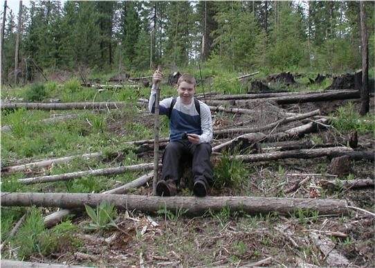 Ryan, sitting on a stump a few meters north of the confluence