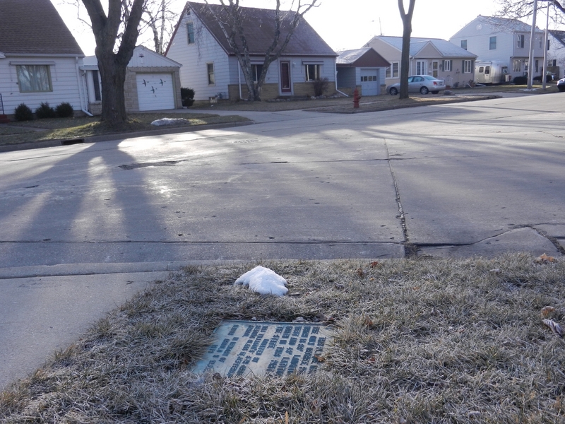 43N 88W lies across the street from the bronze plaque marking its existence. (early morning light)