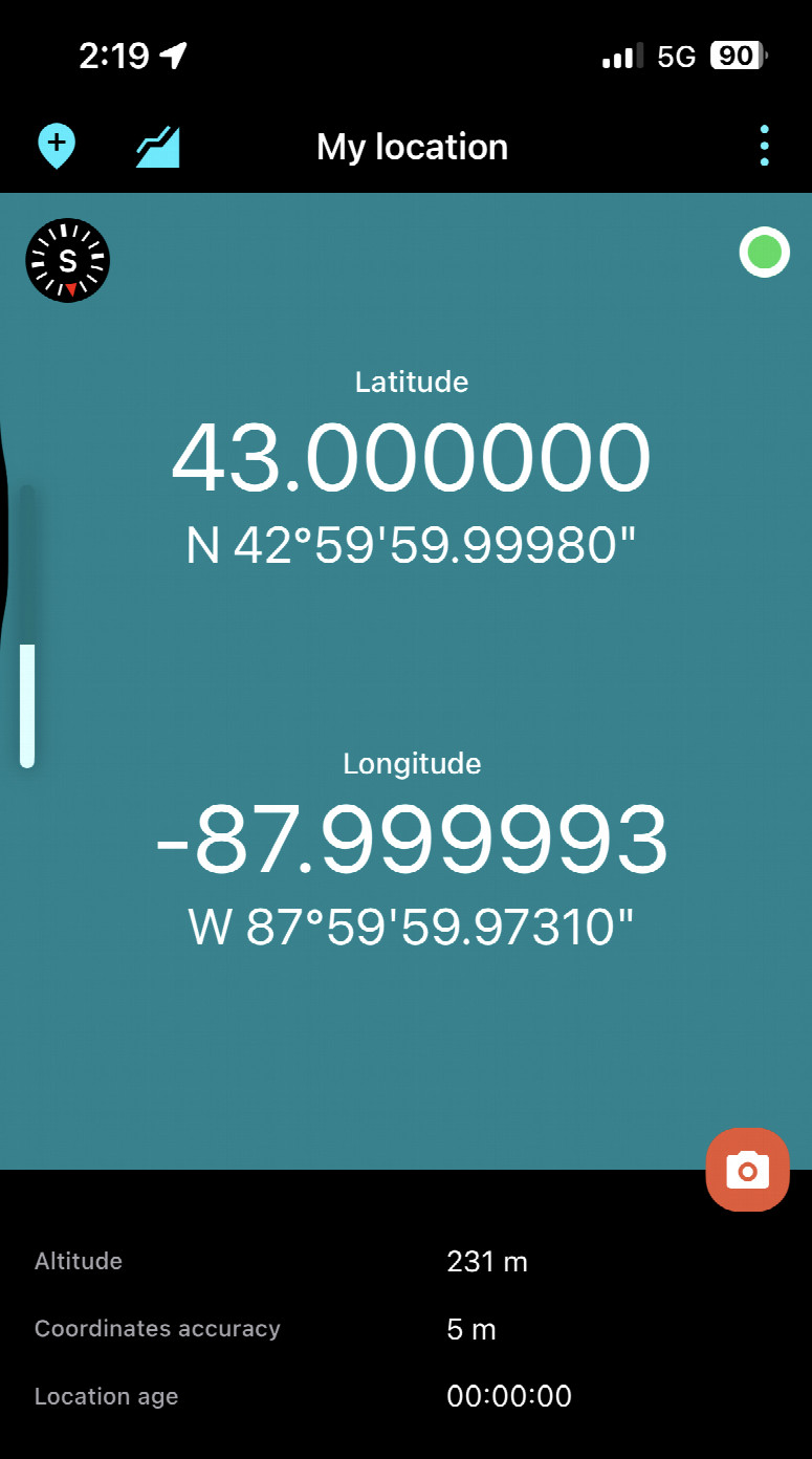 A screenshot of the GPS app, showing zeros on latitude and within seven millionths of a degree on longitude (as well as altitude of 231 m [760 ft] and accuracy)