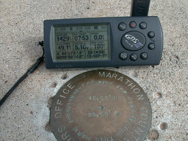 A close-up of the monument and of a GPS (visit #3)