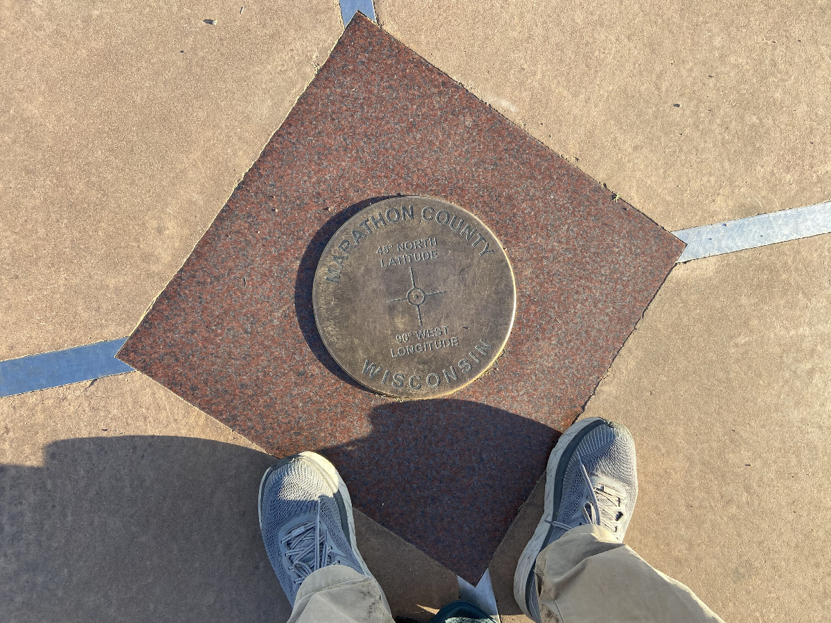 The benchmark marking the confluence point.