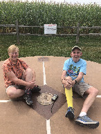 #7: The Harrells forego the nearby benches to rest atop the confluence point.