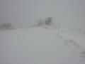 #3: Snow blowing over the hill just east of the confluence.