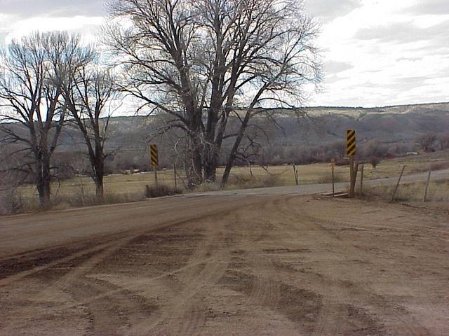 Looking from Colorado to Wyoming at the state line cattle guard and the starting point of the hike.
