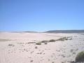 #8: Sand dunes at the beginning.  The confluence is 7 km away through the gap in the ridge.