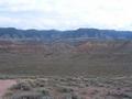 #9: The confluence is located near the center of this shot taken 3 miles SW of the site looking NE.  Not exactly lush.