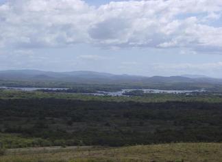 #1: ~10 km to the SOUTH, on the other side of the river CARONI