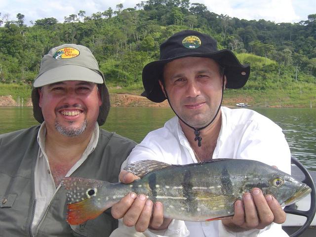 ME AND GIANCARLO WITH ONE OF THE PEACOCK BASS CATCHED AND RELEASED LATER ON