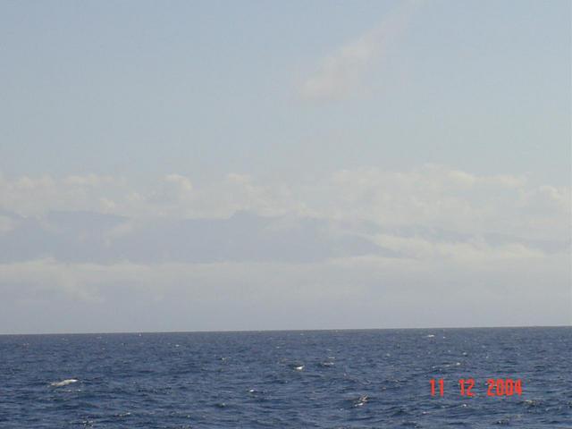 VIEW TO SOUTH. SEE THE MOUNTAINS COVEREDBY FOG AND CLOUDS. BEHIND THE MOUNTAINS IS CARACAS