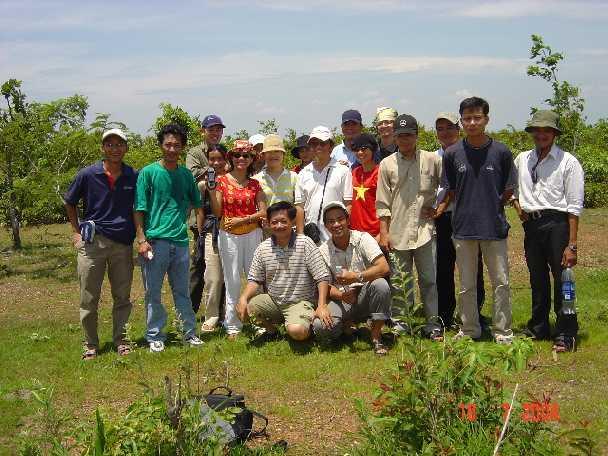 The team, two others are holding cameras