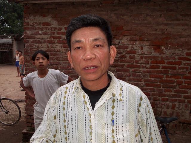 Angry Vietnamese man with alcohol on his breath