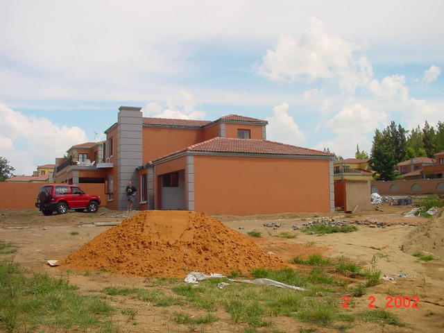 General view of the house looking South, showing the garage which is the location of the Confluence.