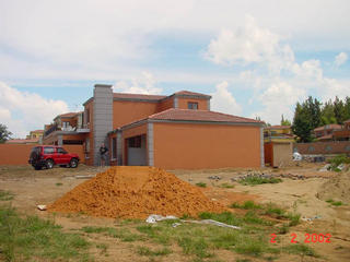 #1: General view of the house looking South, showing the garage which is the location of the Confluence.