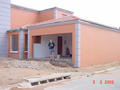 #2: Closer view of the garage, with Pete standing in the entrance.