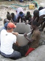 #8: Villagers taking part in the construction of their well